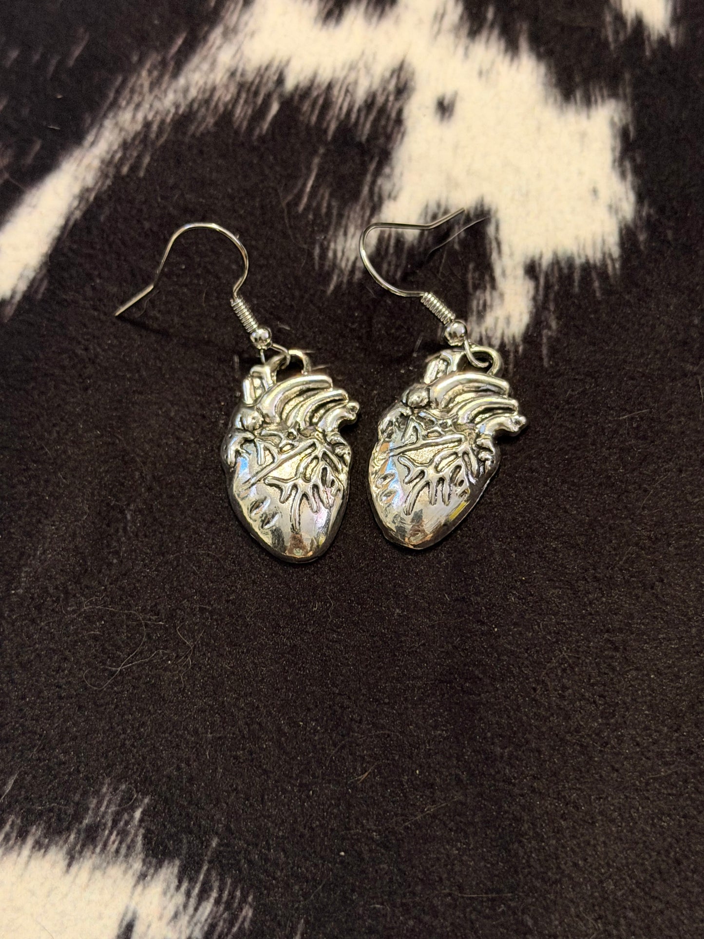 Silver anatomical heart earrings