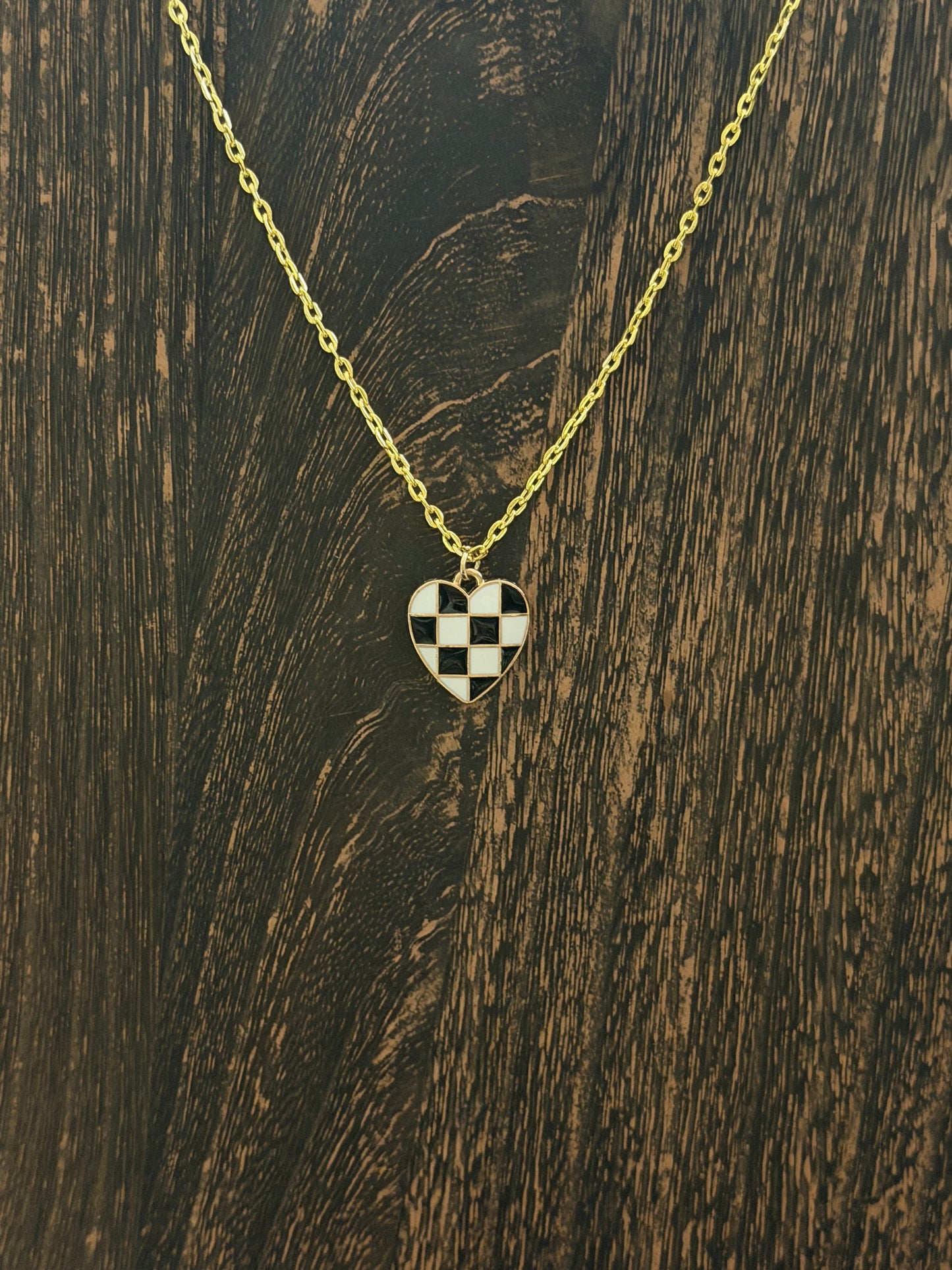 Checkered gold heart charm