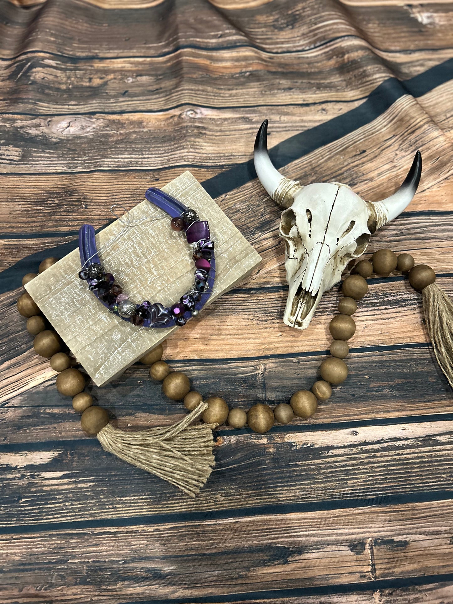 Purple beaded horseshoe