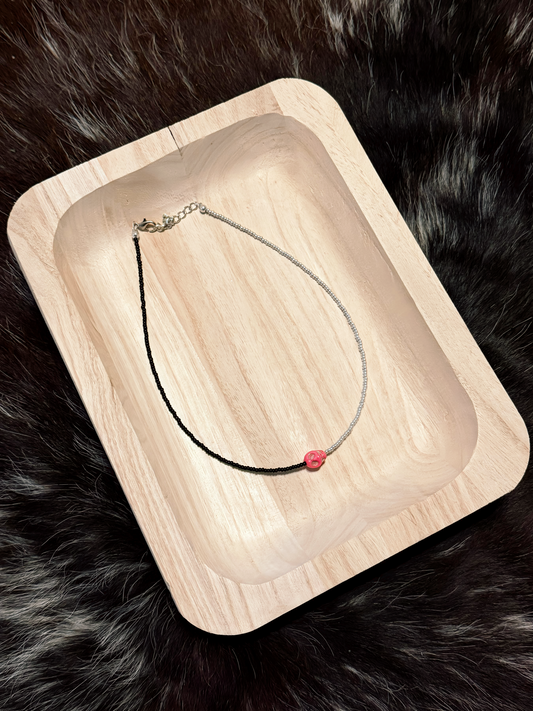 Split skull necklace