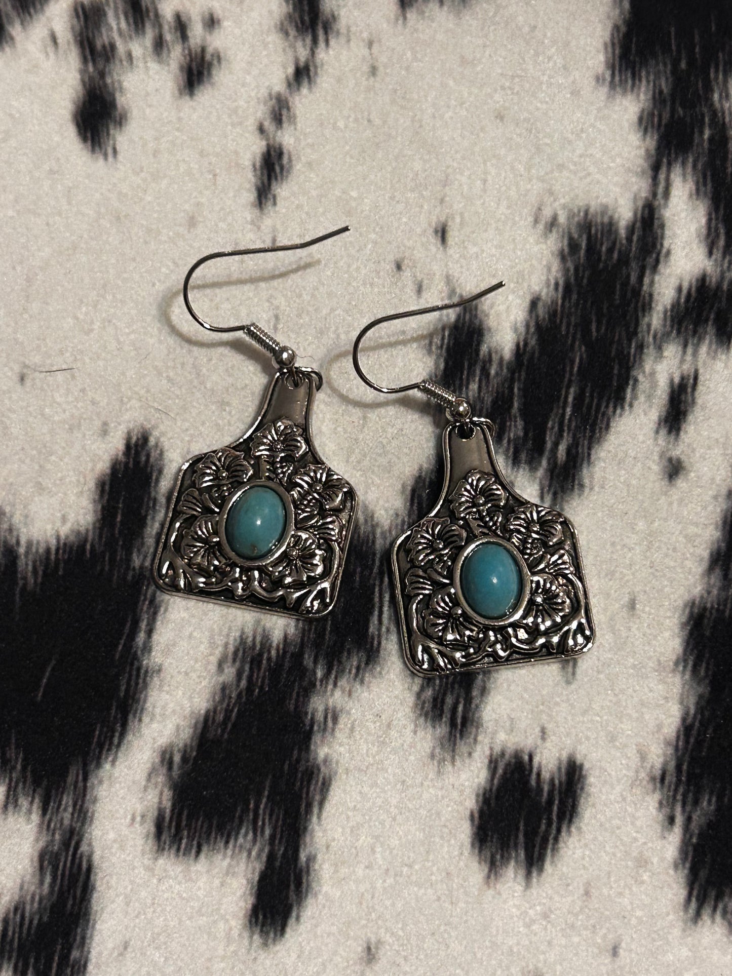 Tooled cow tag earrings