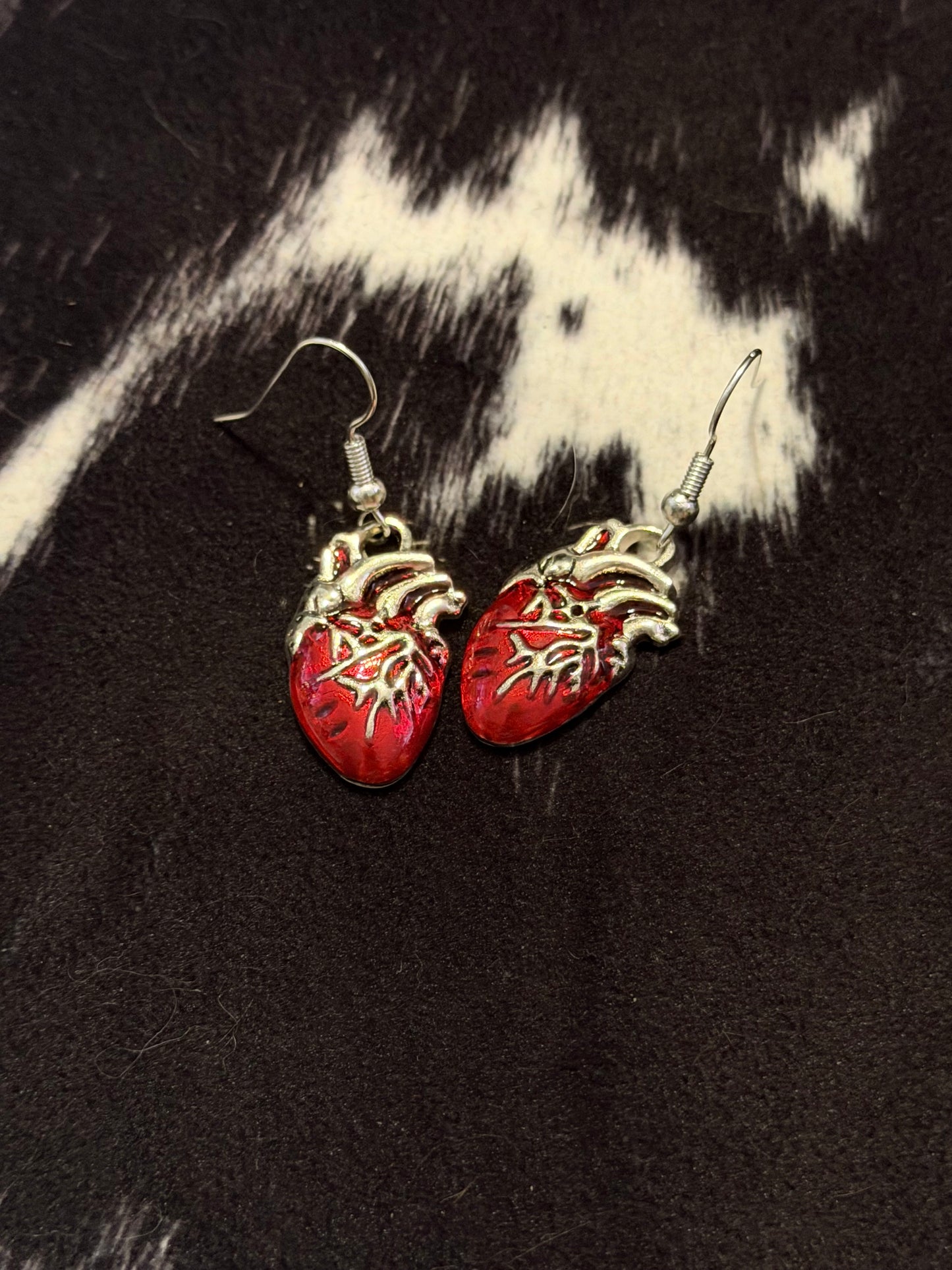 Red anatomical heart earrings