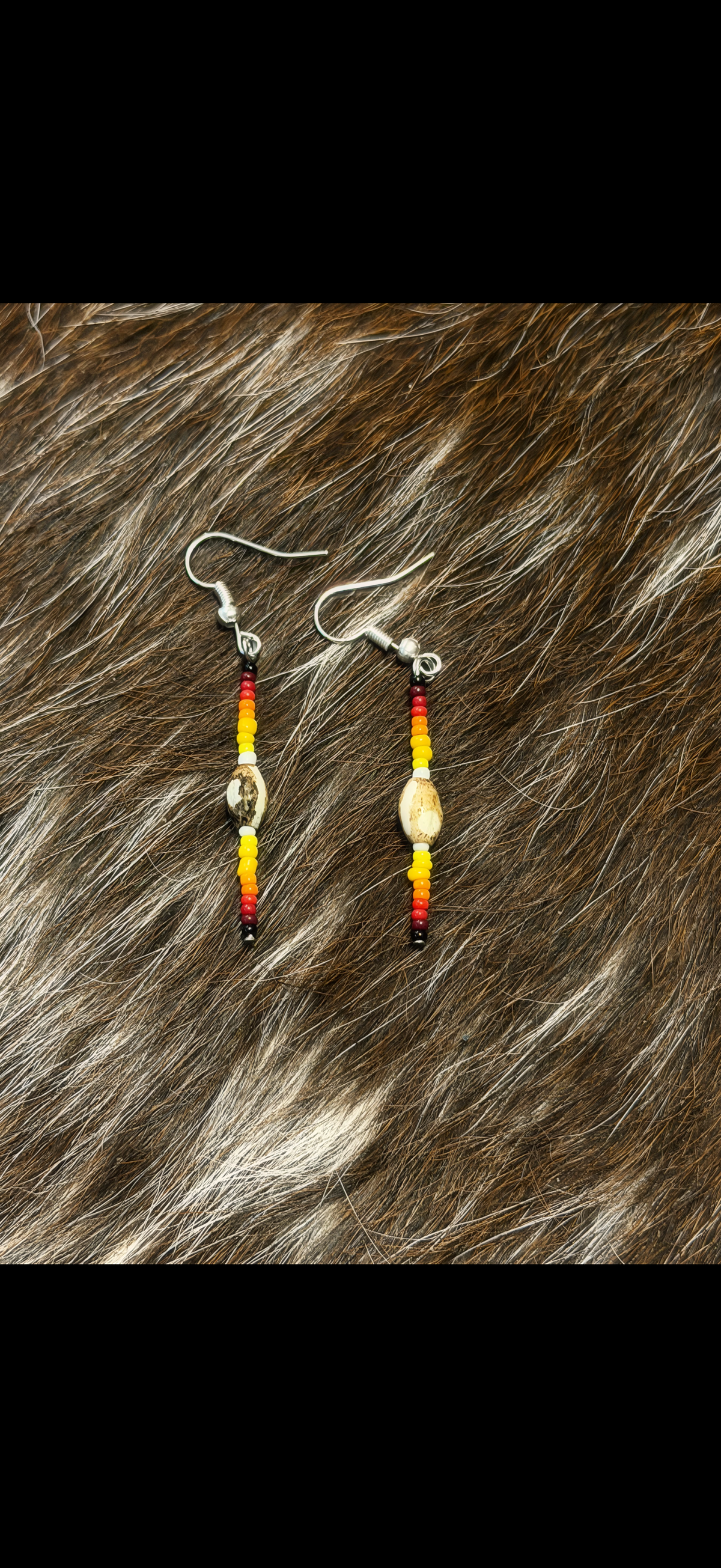 Carved bone earrings