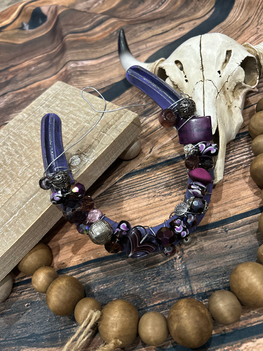 Purple beaded horseshoe