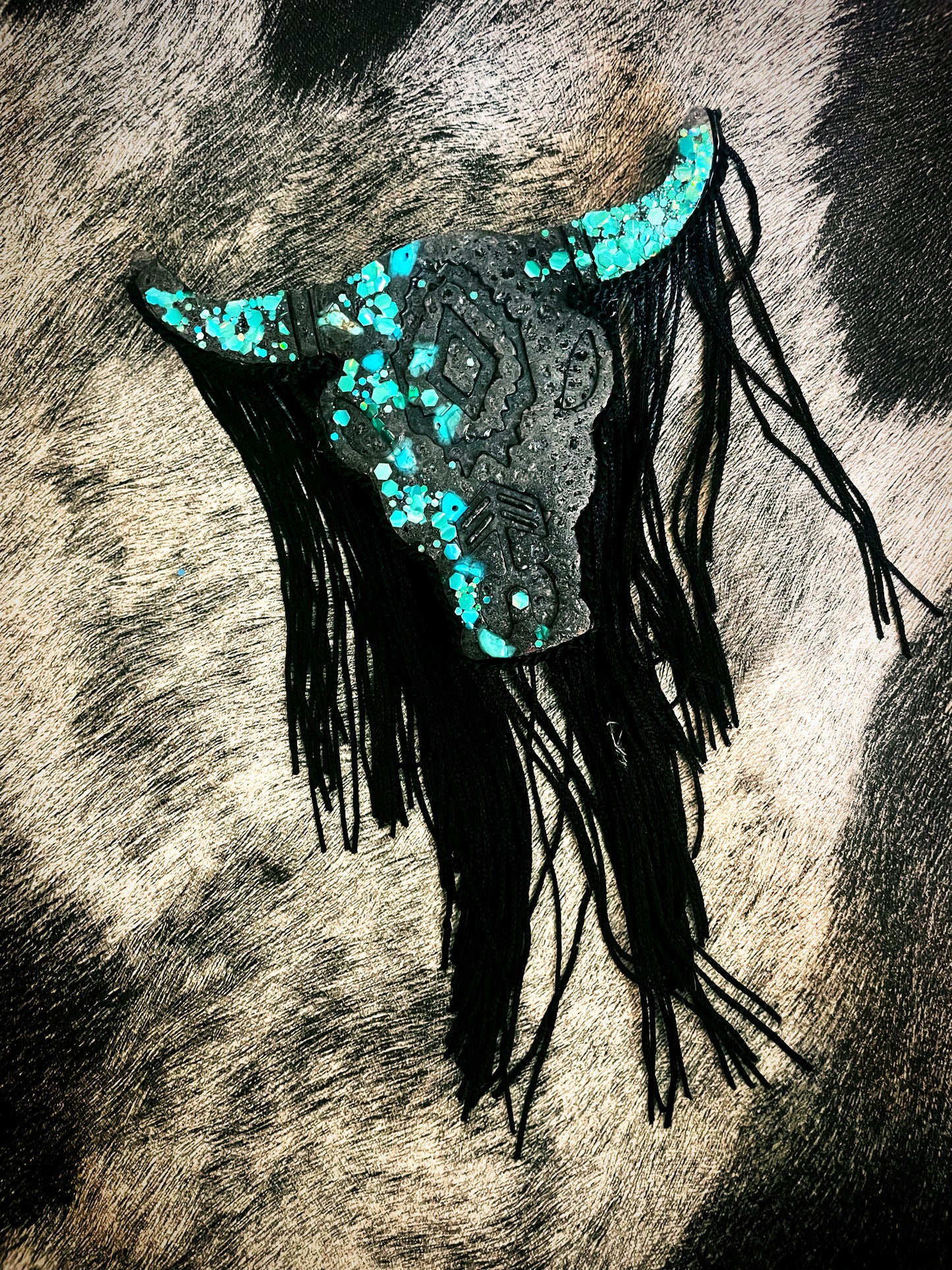 Turquoise and black bull